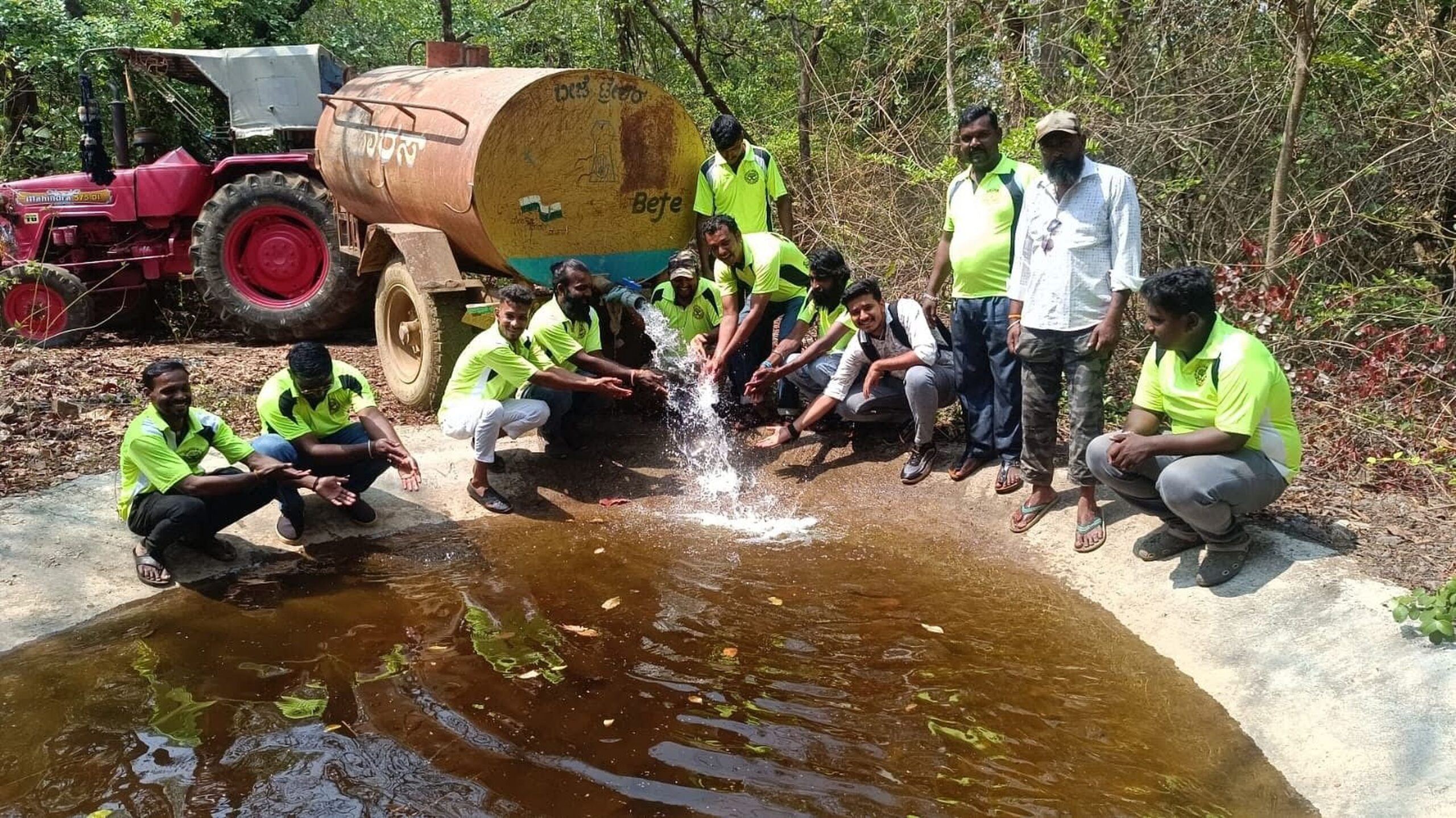 Volunteers are providing water to wild and domestic animals.